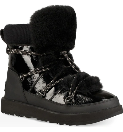 Shop Ugg Highland Genuine Shearling Waterproof Bootie In Black Leather