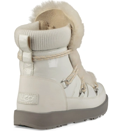 Shop Ugg Highland Genuine Shearling Waterproof Bootie In White Leather