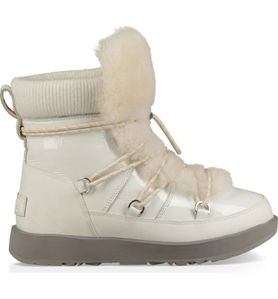 Shop Ugg Highland Genuine Shearling Waterproof Bootie In White Leather