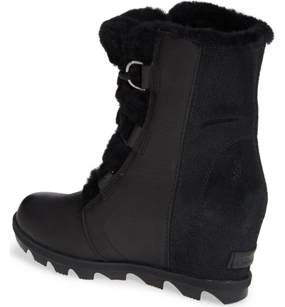 Shop Sorel Joan Of Arctic Ii Lux Wedge Genuine Shearling Bootie In Black