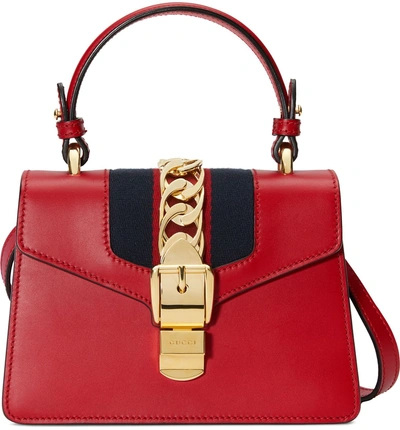 Shop Gucci Mini Sylvie Top Handle Leather Shoulder Bag - Red In Hibiscus Red/brb