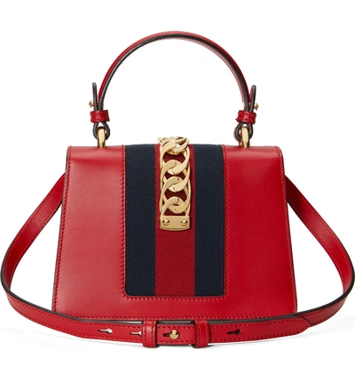 Shop Gucci Mini Sylvie Top Handle Leather Shoulder Bag - Red In Hibiscus Red/brb