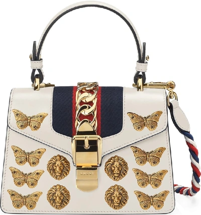 Shop Gucci Mini Sylvie Animal Studs Leather Shoulder Bag - White In Mystic White