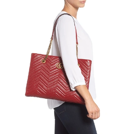 Shop Gucci Gg Marmont 2.0 Matelasse Medium Leather East/west Tote Bag - Red In Cerise/ Cerise