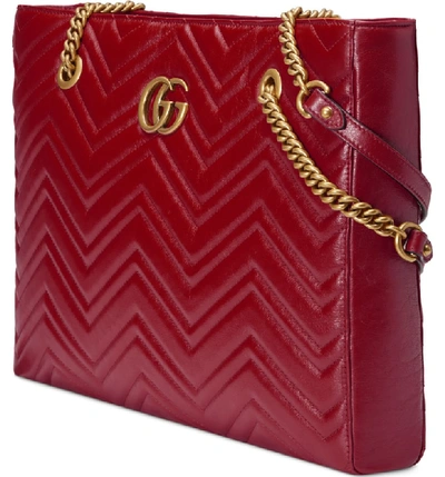 Shop Gucci Gg Marmont 2.0 Matelasse Medium Leather East/west Tote Bag - Red In Cerise/ Cerise