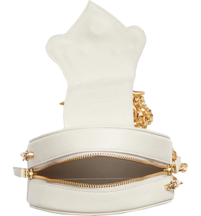 Shop Okhtein Mini Dome Crossbody Clutch - White In Ivory X Gold