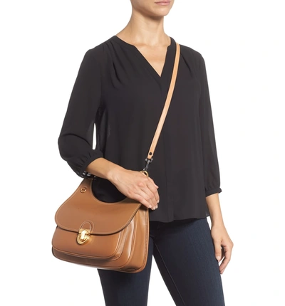 Shop Tory Burch James Leather Saddle Bag - Brown In Moose