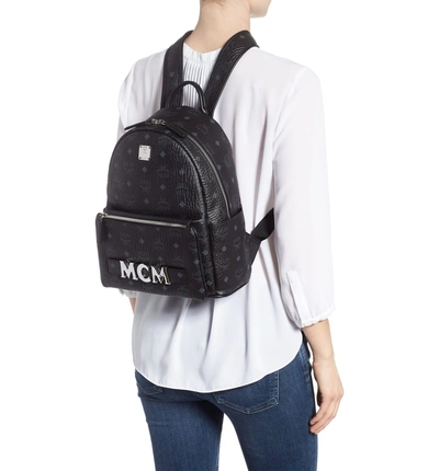 Shop Mcm Small Stark Trilogie Canvas Backpack - Black