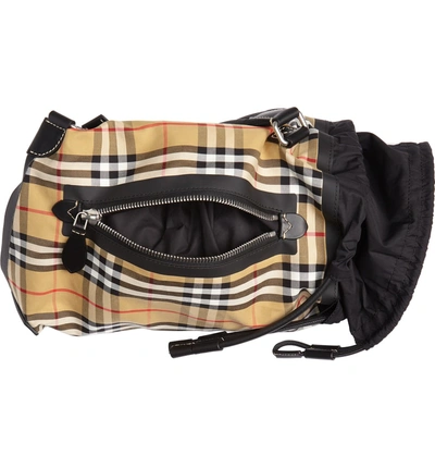 Shop Burberry Small Vintage Check Sailing Duffle Sling Bag In Antique Yellow