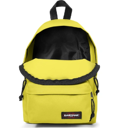 Shop Eastpak Eastpack Orbit Canvas Backpack - Yellow In Young Yellow