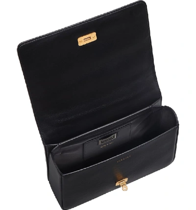Shop Versace Tribute Print Leather Shoulder Bag - Black In Black Multi/ Gold