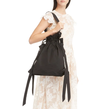 Shop Simone Rocha Bow Drawstring Bag - Black