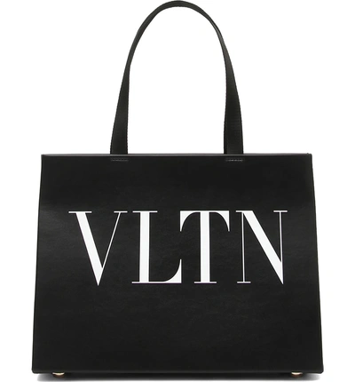 Shop Valentino Vltn Leather Tote - Black In Nero/ Bianco
