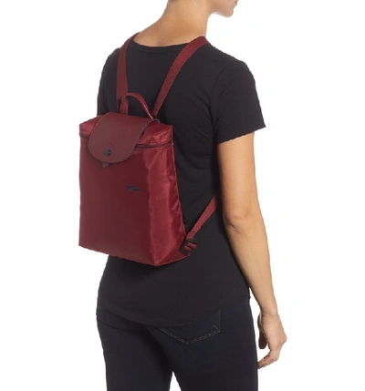 Shop Longchamp Le Pliage Club Backpack In Garnet Red
