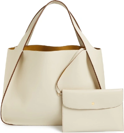 Shop Stella Mccartney Medium Perforated Logo Faux Leather Tote - White In Pure White