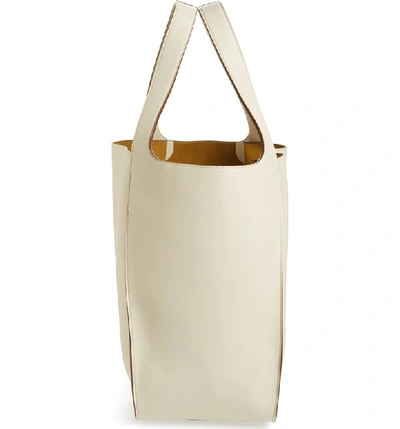 Shop Stella Mccartney Medium Perforated Logo Faux Leather Tote - White In Pure White