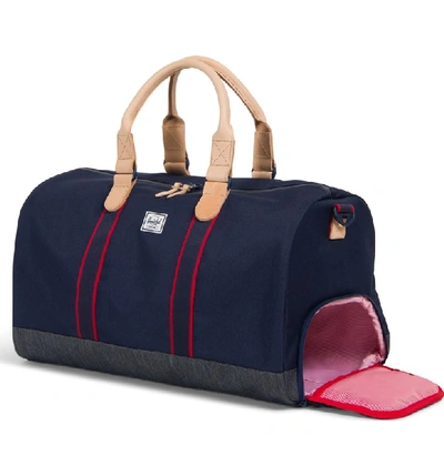 Shop Herschel Supply Co Novel Offset Duffel Bag - Blue In Pea Coat/ Dark Denim