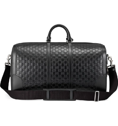 Shop Gucci Signature Strap Leather Duffel - Black