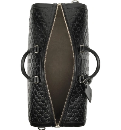 Shop Gucci Signature Strap Leather Duffel - Black