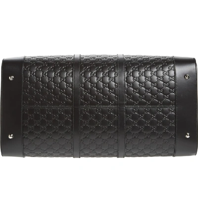 Shop Gucci Signature Strap Leather Duffel - Black