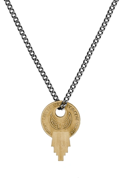 Shop Miansai Wise Lock Brass Pendant Necklace In Matte Brass