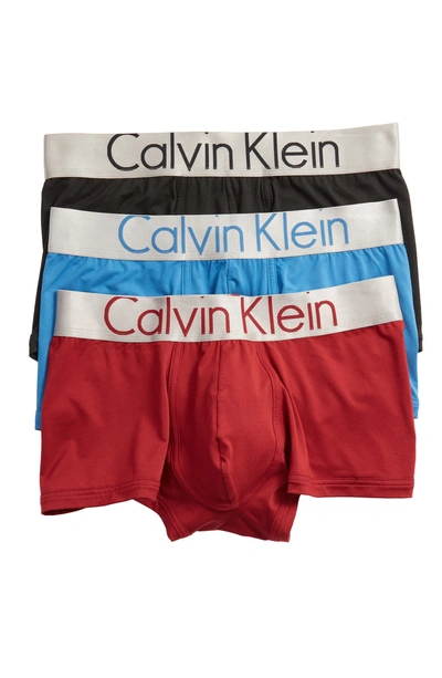 Shop Calvin Klein 3-pack Low Rise Trunks In Black/ Fire Brick/ Blue