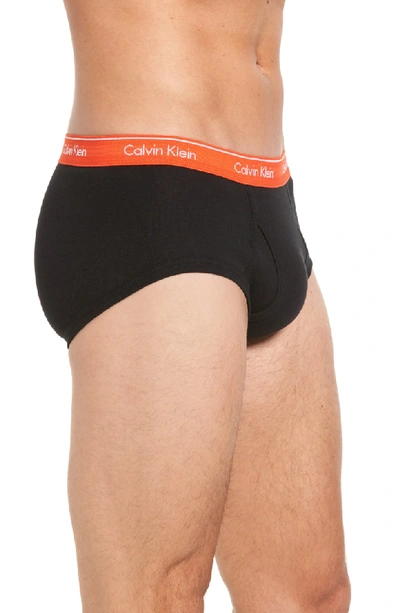 Shop Calvin Klein 4-pack Cotton Briefs In Black W/ Orange/ Blue/ Black