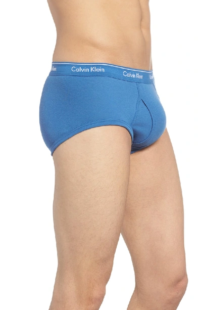 Shop Calvin Klein 4-pack Cotton Briefs In Oriole/ Stony/ White