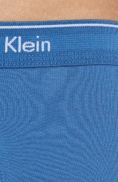 Shop Calvin Klein 4-pack Cotton Briefs In Oriole/ Stony/ White