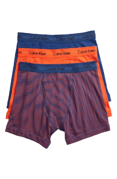 Shop Calvin Klein 3-pack Boxer Briefs In Dark Night/ Spicy Orange