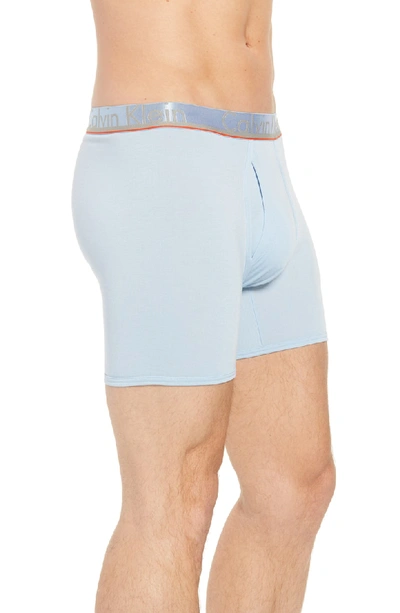 Shop Calvin Klein 3-pack Comfort Microfiber Boxer Briefs In Rapid Blue/ Blue/ Oriole