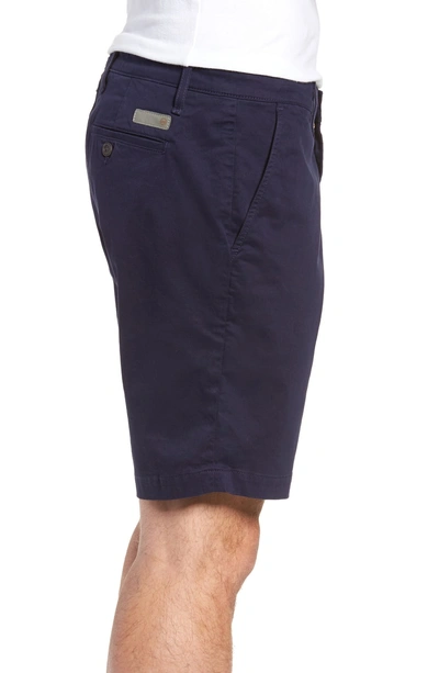 Shop Ag Wanderer Modern Slim Fit Shorts In Indigo Ink