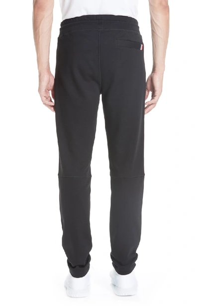 Shop Moncler Cotton Sweatpants In Black