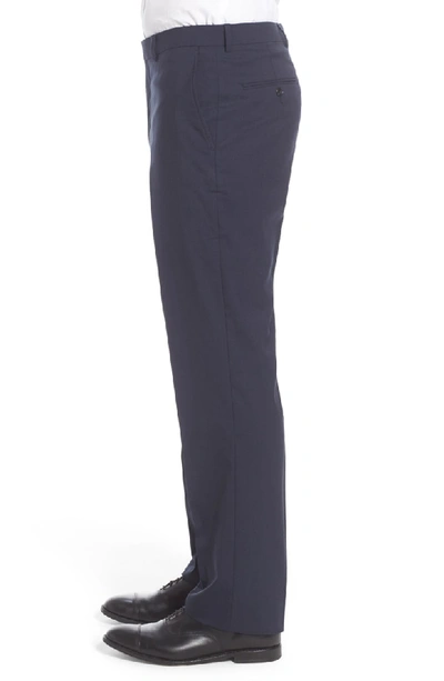 Shop Hart Schaffner Marx Flat Front Solid Stretch Wool Trousers In Navy Solid