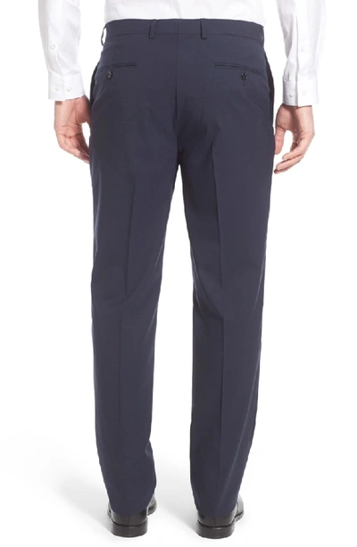 Shop Hart Schaffner Marx Flat Front Solid Stretch Wool Trousers In Navy Solid