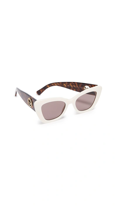 Shop Fendi Narrow Cat Eye Logo Sunglasses In White