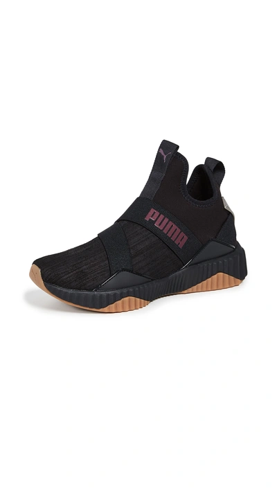 Puma Defy Luxe Sneakers In Black/fig | ModeSens