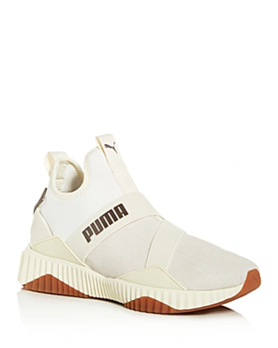 Shop Puma Women's Defy Luxe Mid-top Sneakers In White