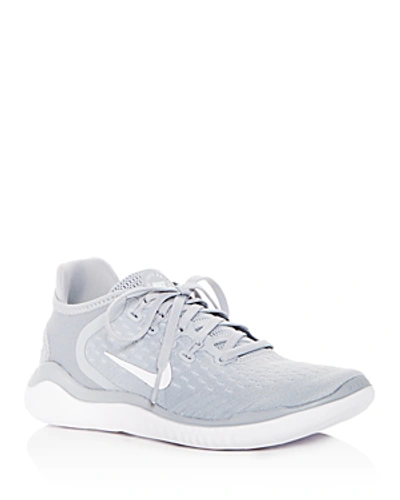 Shop Nike Women's Free Rn 2018 Lace-up Sneakers In Wolf Gray/white