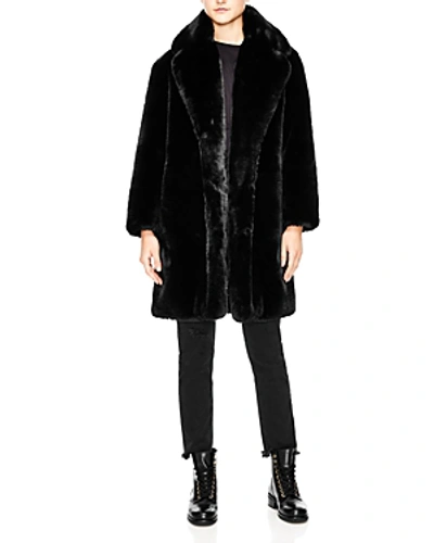 Shop Sandro Ballote Faux-fur Teddy Coat In Black