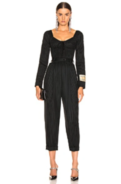 Shop Dolce & Gabbana Long Sleeve Pinstriped Jumpsuit In Black