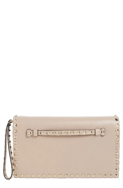 Shop Valentino Rockstud Leather Flap Clutch - Beige In Poudre