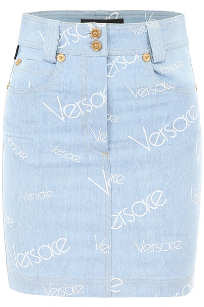 Shop Versace All Over Logo Print Denim Skirt In Blue