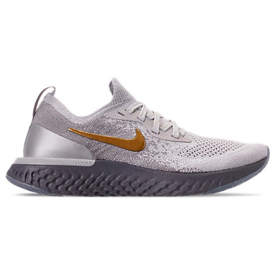 Shop Nike Women's Epic React Flyknit Running Shoes, Grey - Size 6.0