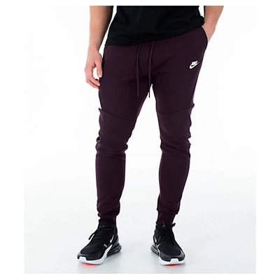 Shop Nike Men's Tech Fleece Jogger Pants, Red