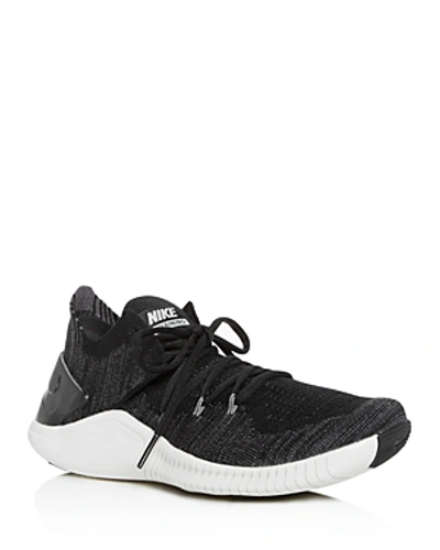 Shop Nike Women's Free Tr 3 Flyknit Low-top Sneakers In Black/dark Gray Phantom