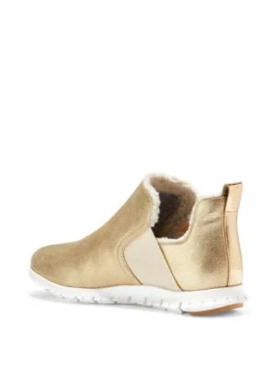 Shop Cole Haan Zerogrand Slip-on Boots In Gold