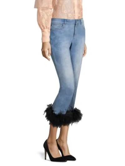 Shop Alice And Olivia Tasha Cropped Feather Hem Jeans In 90s Wash