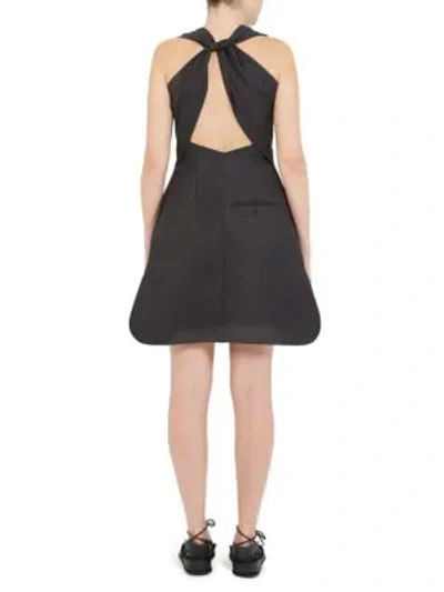 Shop Carven Twisted Open-back Fit-and-flare Dress In Noir