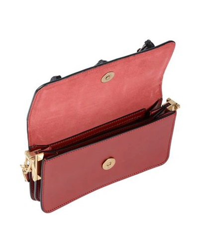 Shop Valentino Handbag In Red